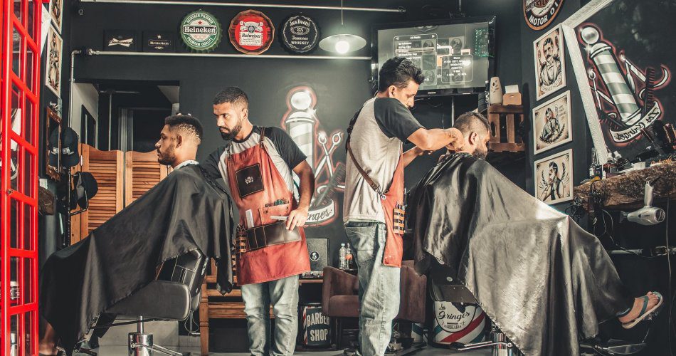 men having their haircut