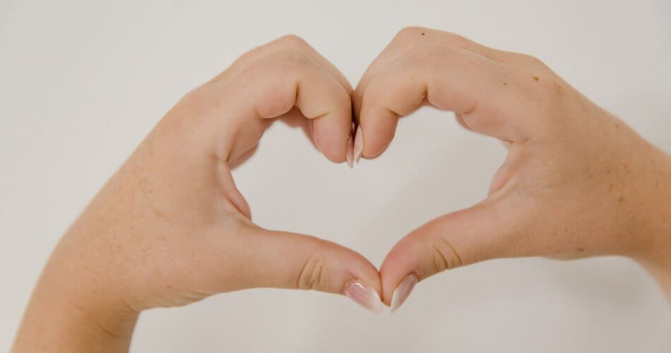 hands showing heart sign